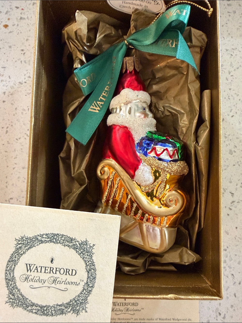 Waterford Red Santa with Gold Sleigh and Multicolor Gifts Ornament